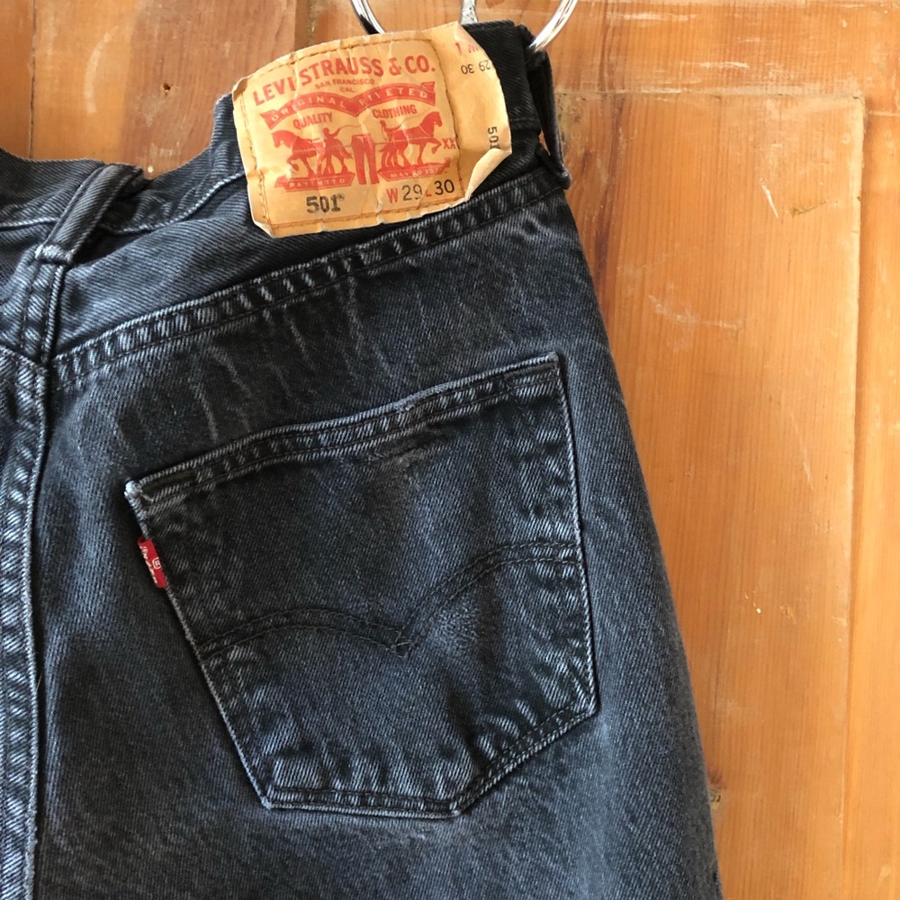 Black wash Levi’s 501 jeans